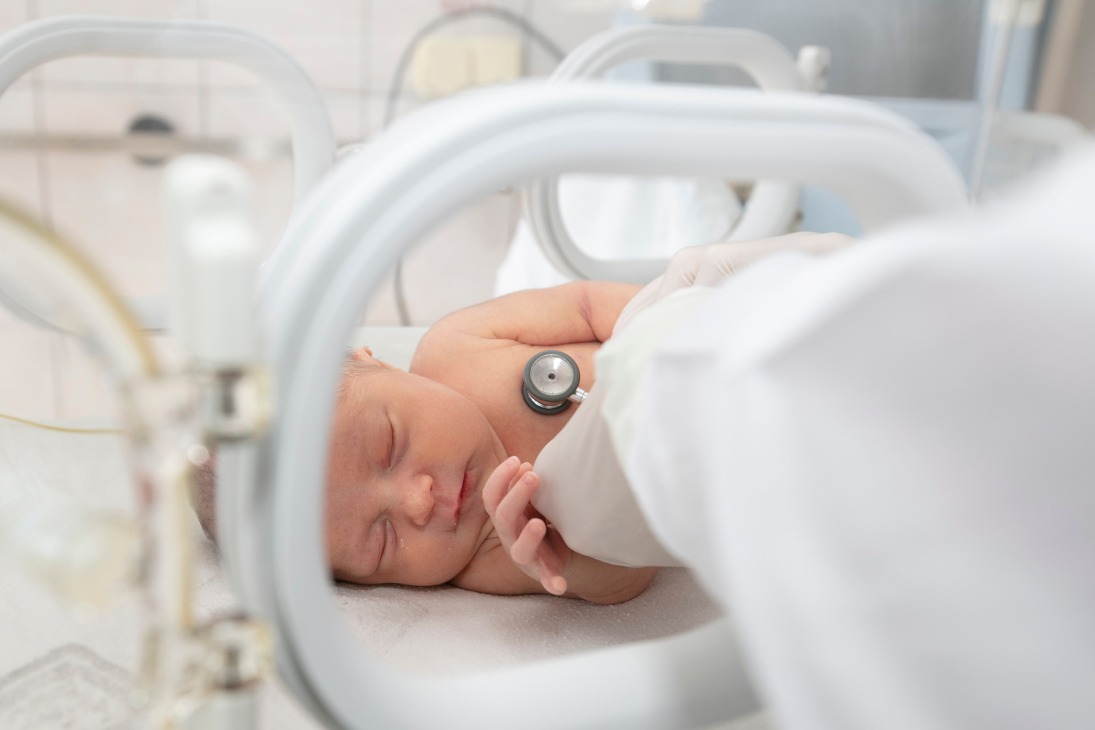 A newborn baby lies in boxes in the hospital. A child in an incubator. Neonatal and Premature Intensive Care Unit